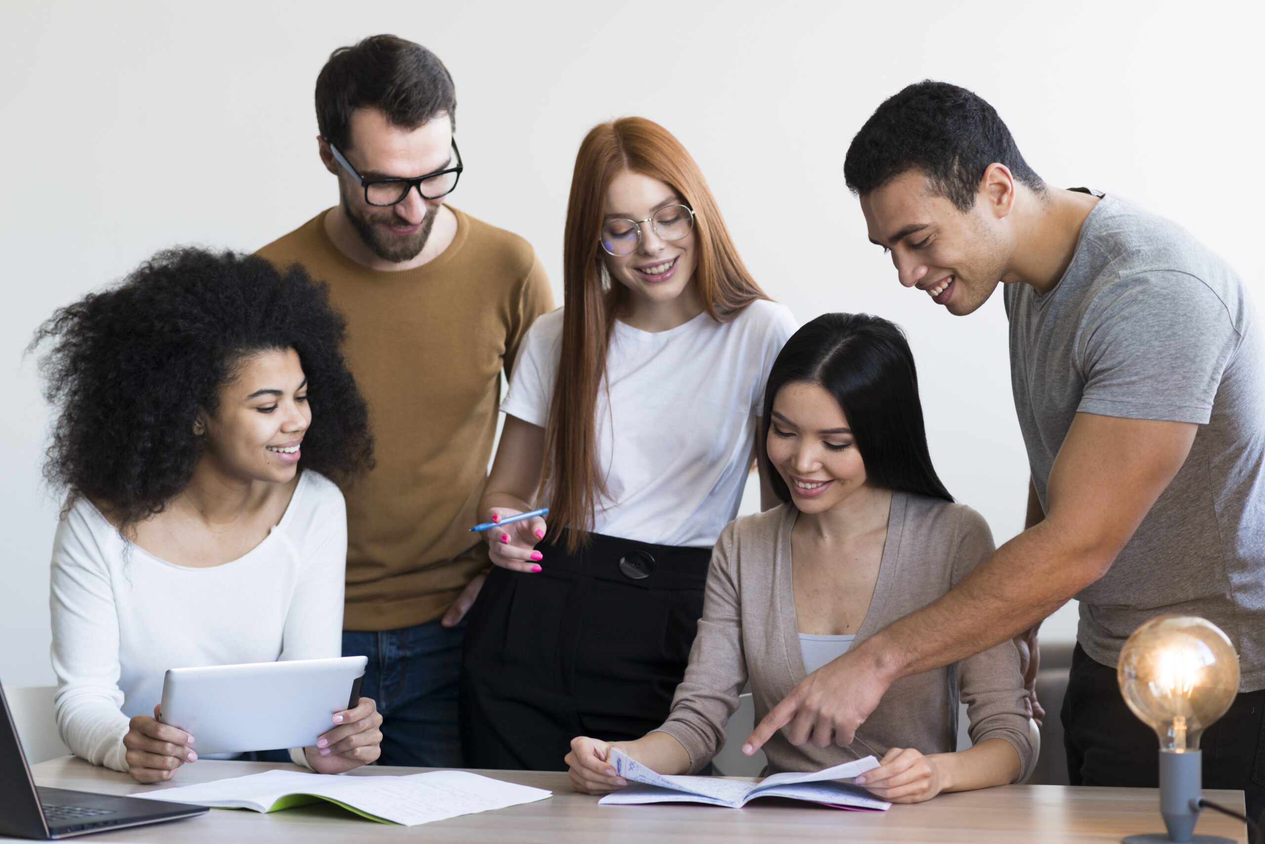 group-positive-young-people-working-together